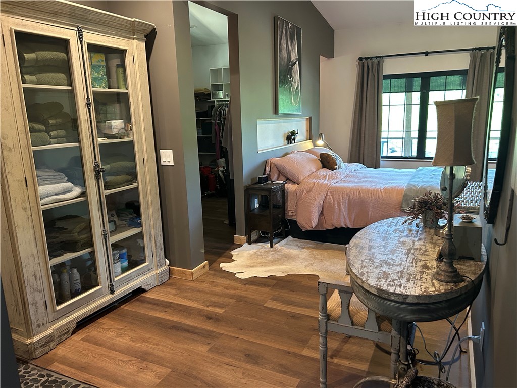 509 Grant Houck Road Todd, NC 28684 - Photo 35 of 50 a bedroom with bed and a window