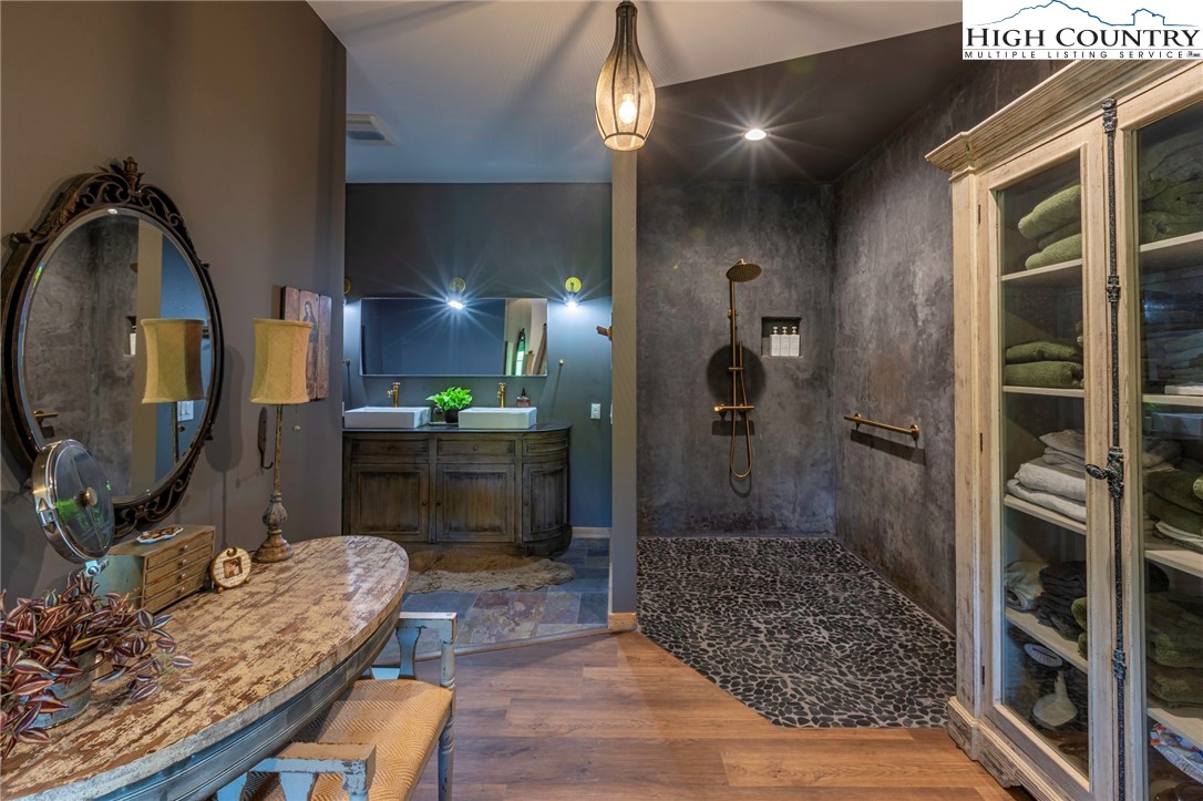 509 Grant Houck Road Todd, NC 28684 - Photo 36 of 50 a bathroom with a sink a toilet and shower