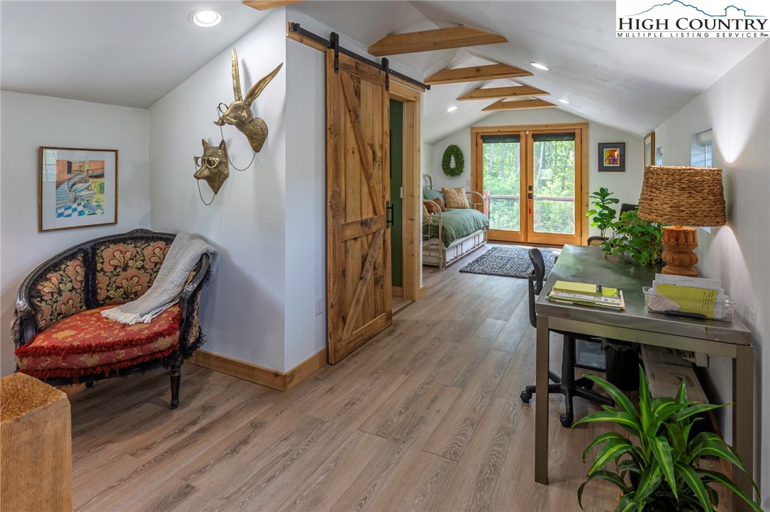 509 Grant Houck Road Todd, NC 28684 - Photo 43 of 50 a living room with furniture and a potted plant