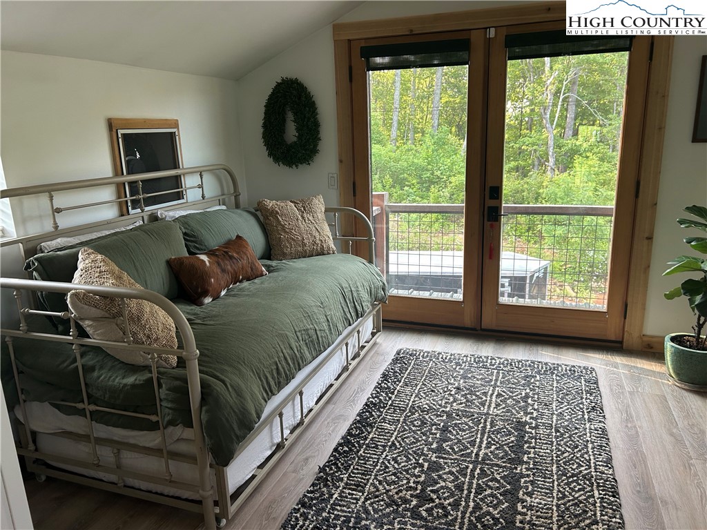 509 Grant Houck Road Todd, NC 28684 - Photo 45 of 50 a bedroom with a bed and window