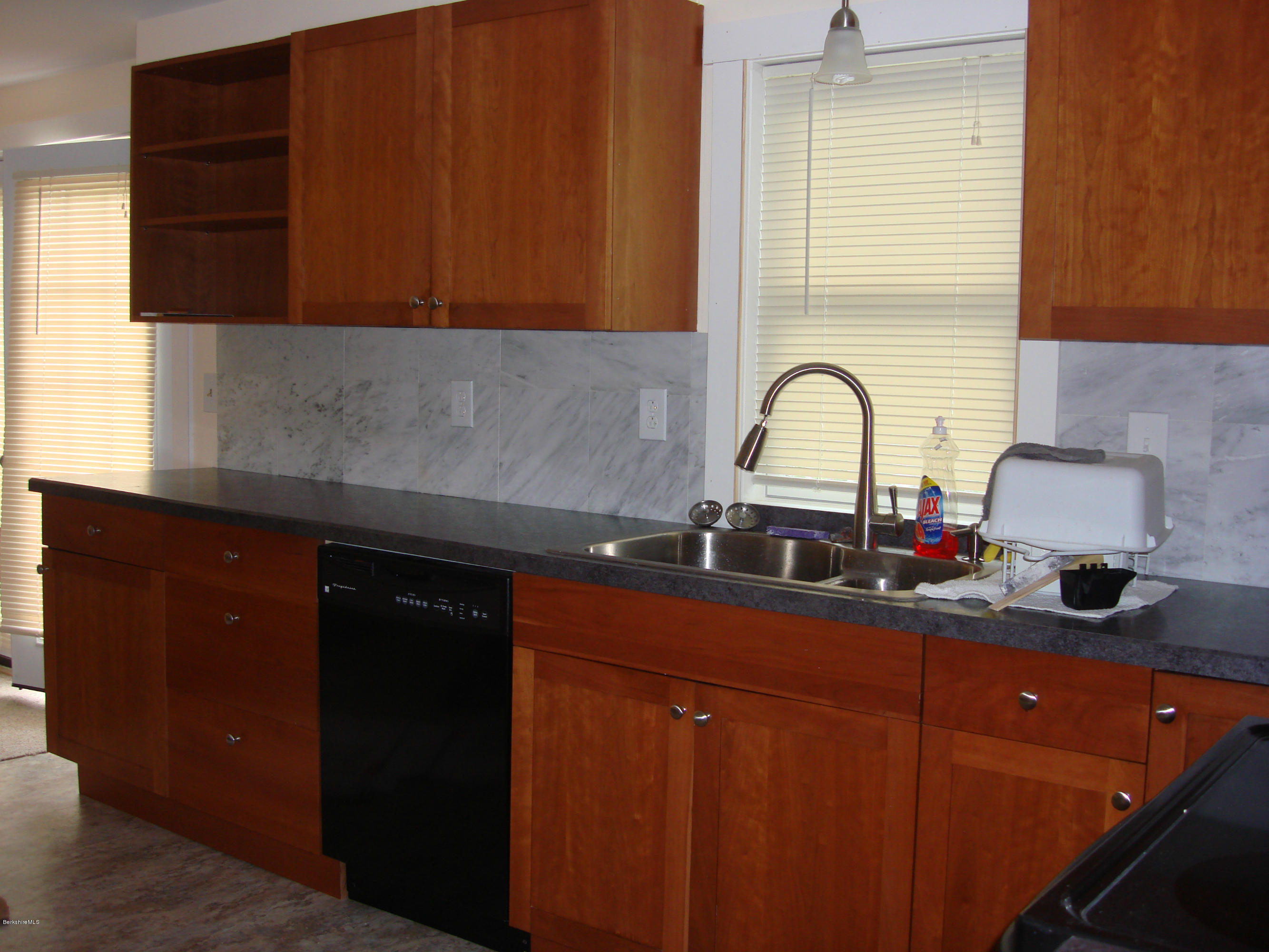91 Middlefield Road Peru, MA 01235 - Photo 2 of 21 a kitchen with sink and cabinets