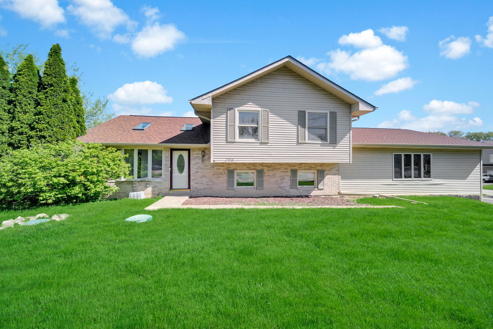 396 Ridgeland Avenue West Chicago, IL 60185 - Photo 1 of 1 a view of a house with a yard porch and sitting area