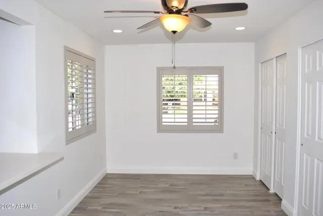 a bathroom with a sink toilet and a mirror