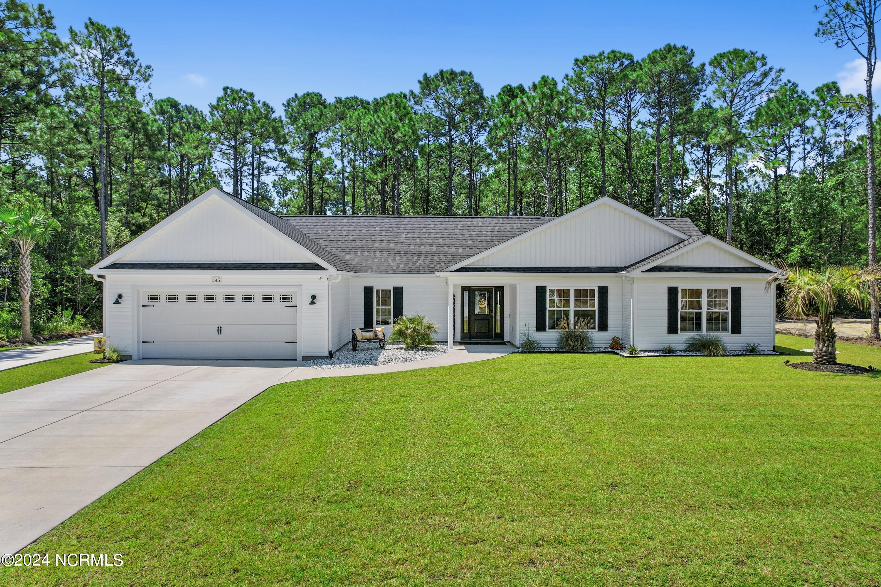 185 Boundary Loop Road Northwest Calabash, NC 28467 - Photo 1 of 56 Front of home