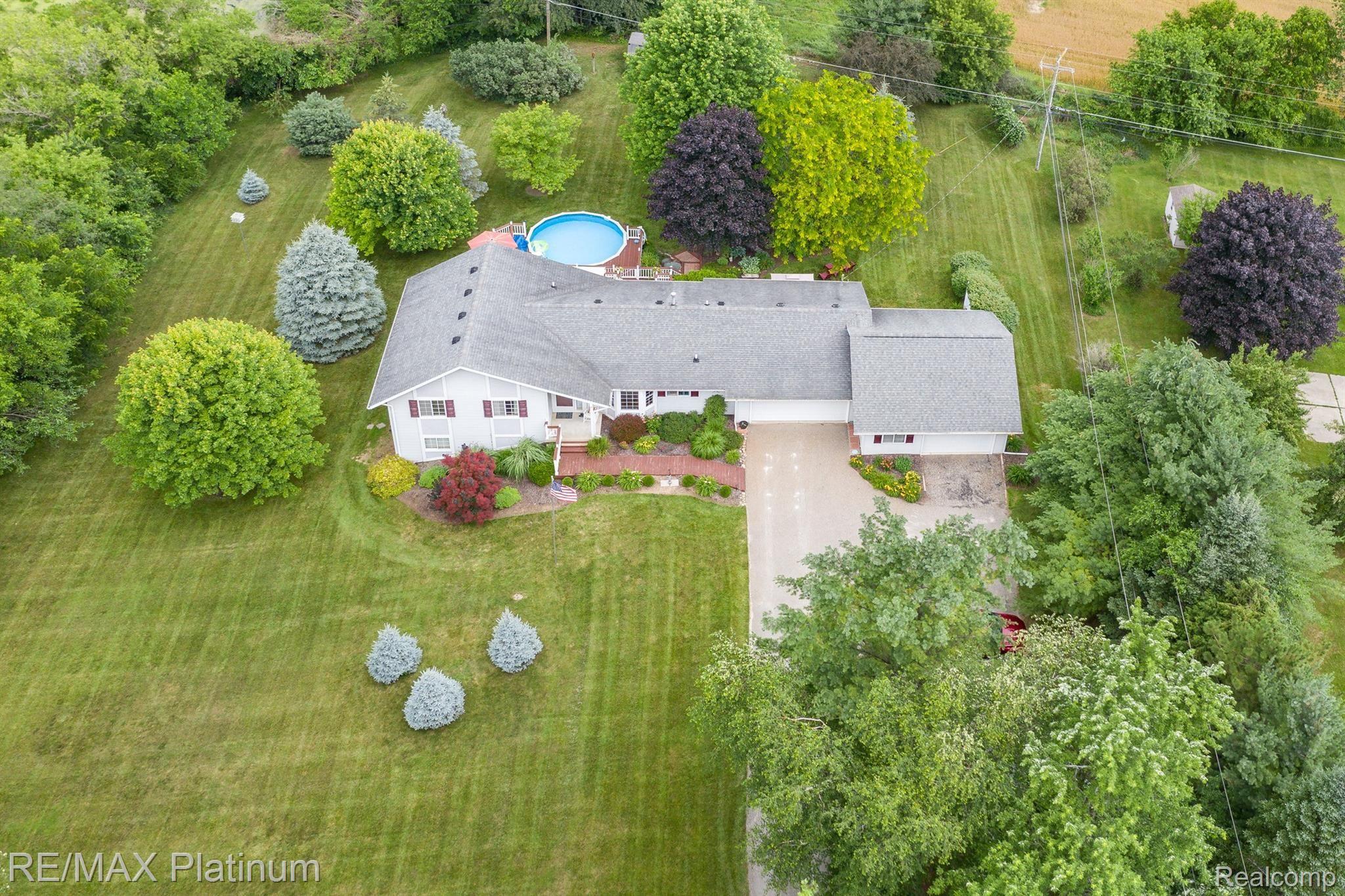 3738 West Schafer Road Pinckney, MI 48169 - Photo 5 of 75 Aerial view of house and grounds.