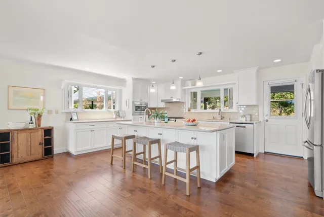 a bedroom with a bed and a cabinets