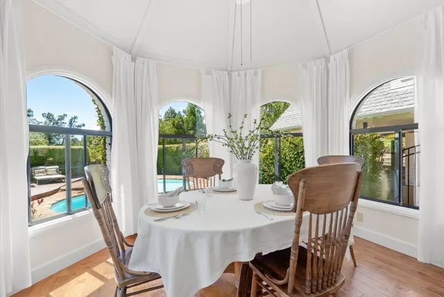 a spacious bedroom with a bed and a couch