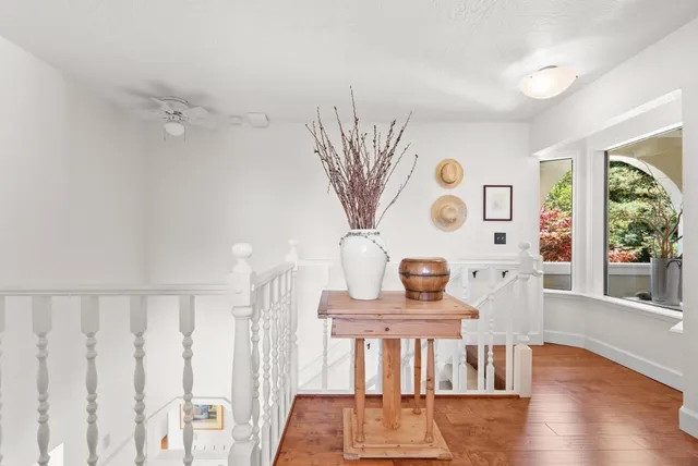 a view of a patio with couches and potted plants