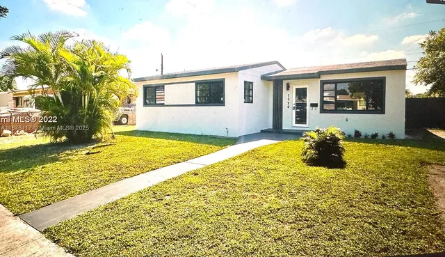 a view of a house with swimming pool