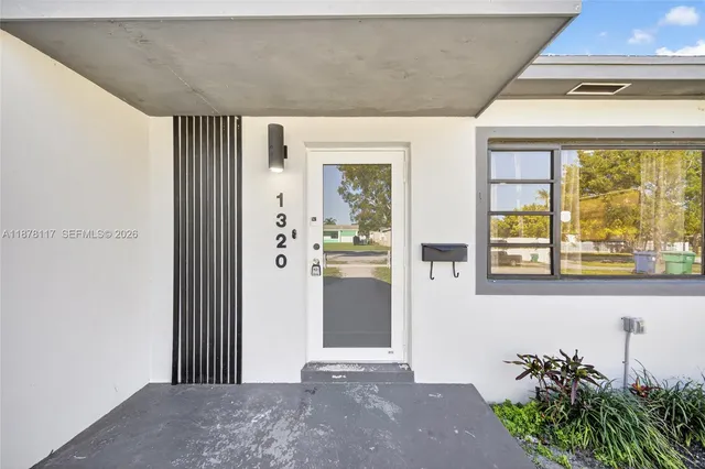 a view of entryway with a front door