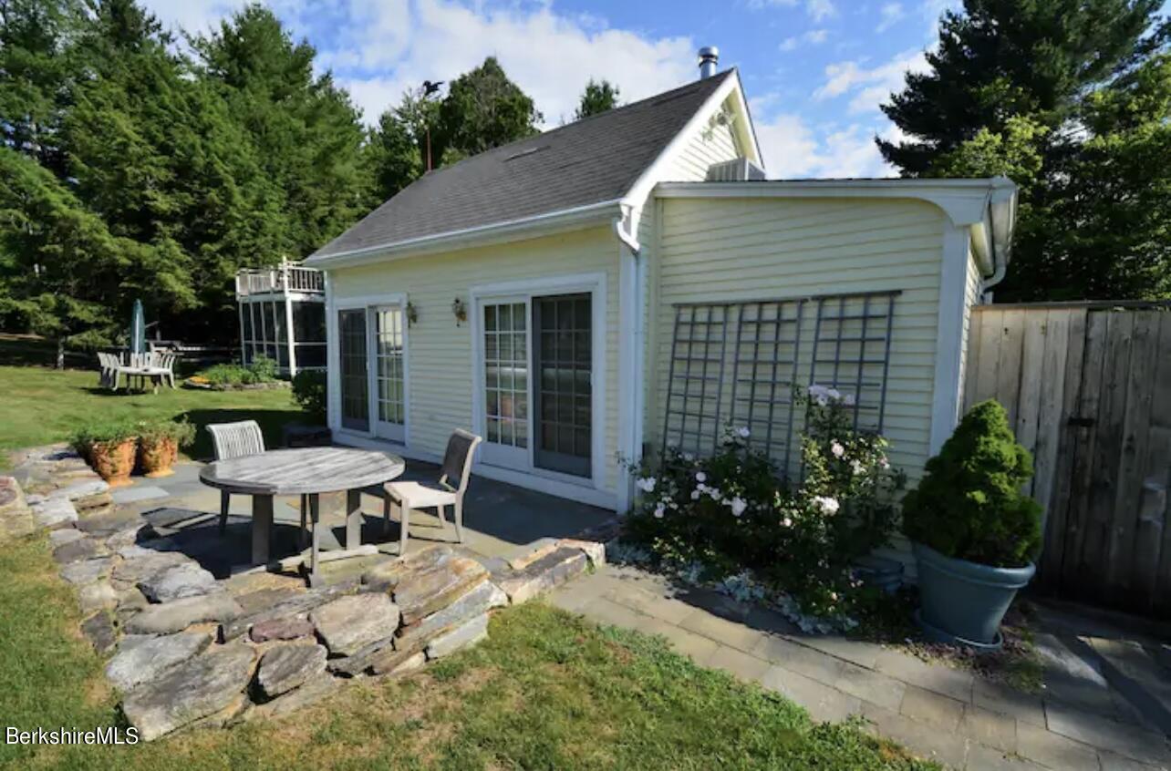 75 Old Quarry Road Otis, MA 01253 - Photo 30 of 39 a view of a house with backyard and sitting area