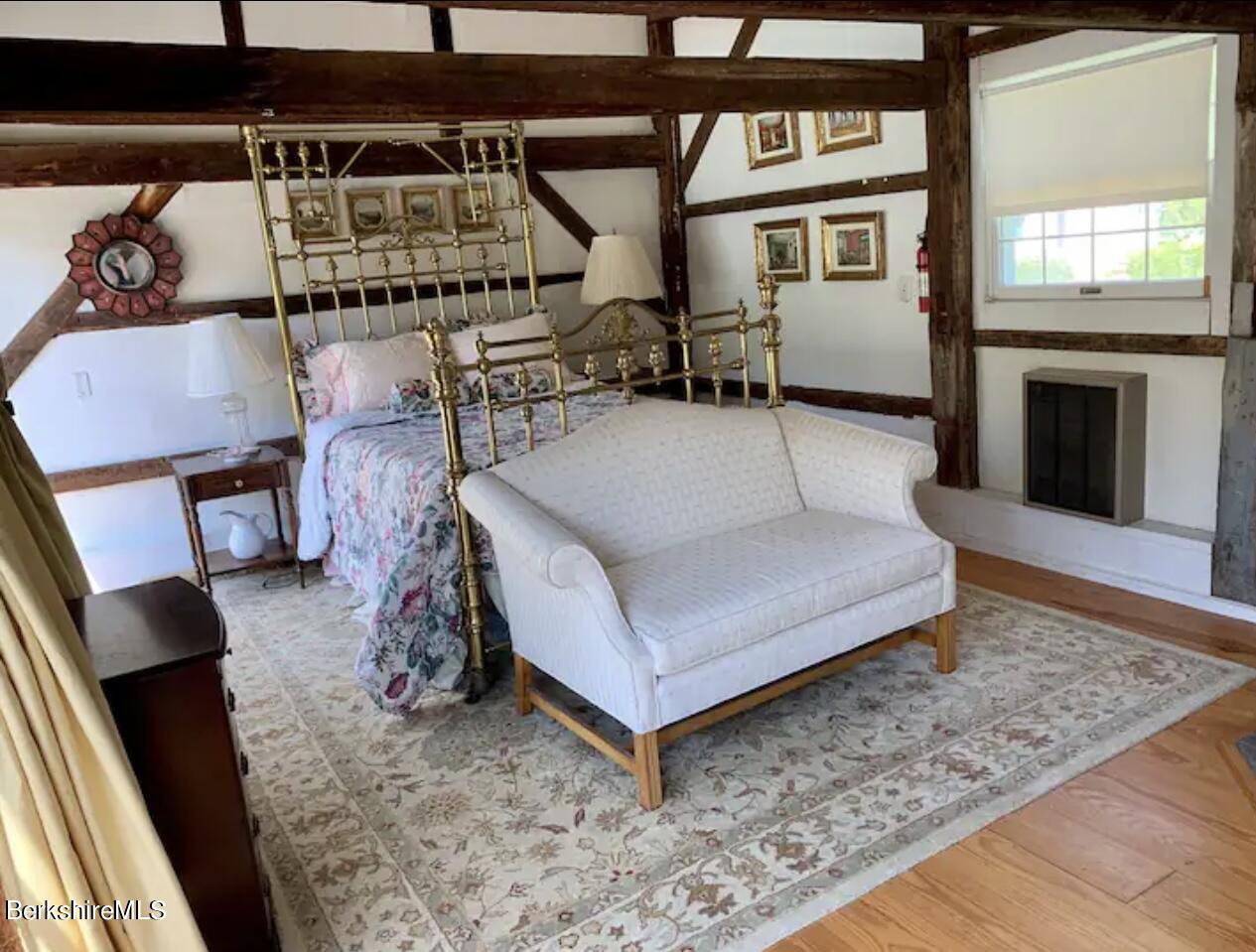 75 Old Quarry Road Otis, MA 01253 - Photo 31 of 39 a living room with furniture and a fireplace