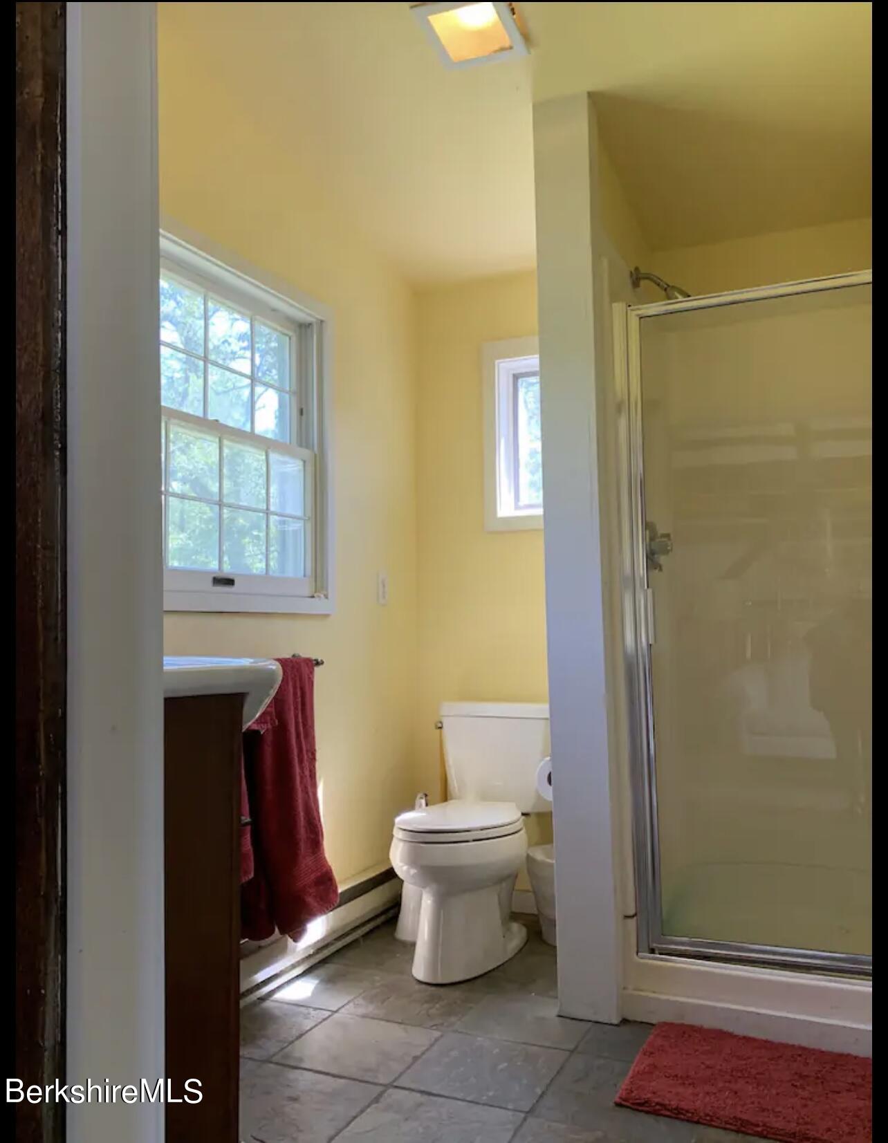 75 Old Quarry Road Otis, MA 01253 - Photo 33 of 39 a bathroom with a toilet and a shower