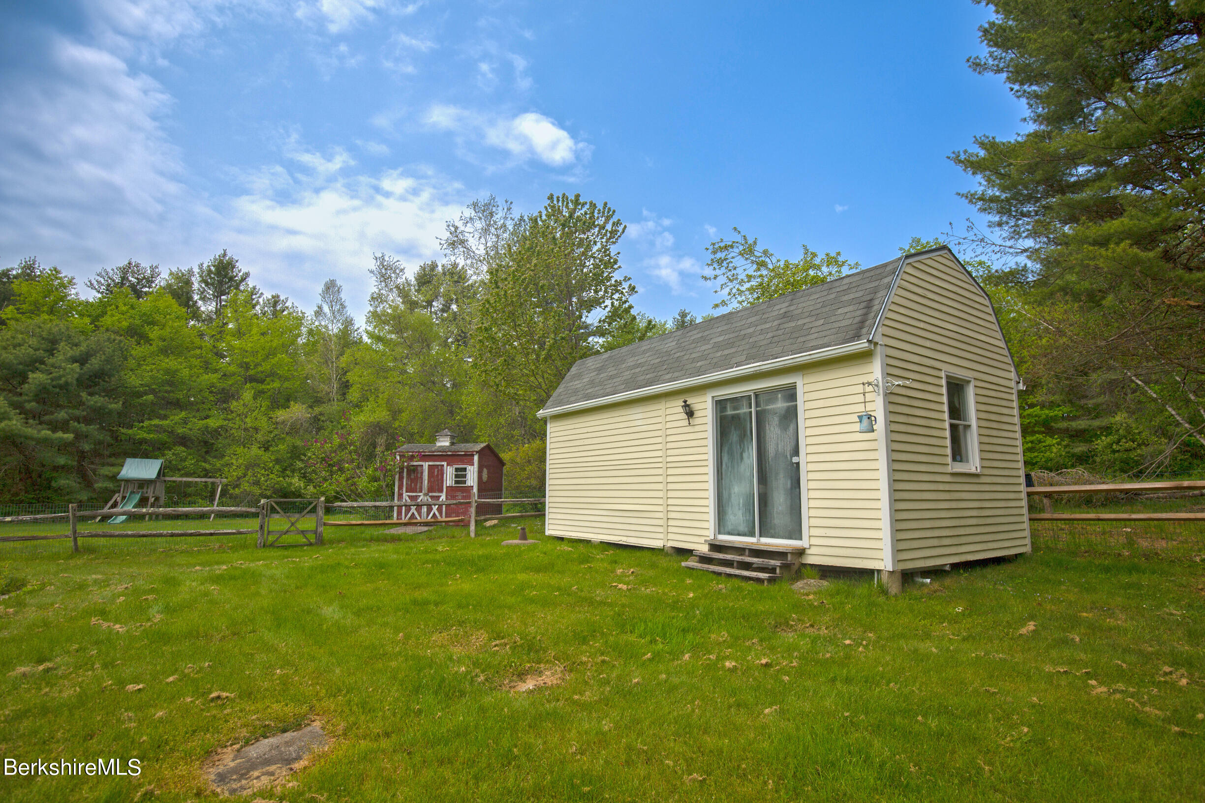 75 Old Quarry Road Otis, MA 01253 - Photo 35 of 39 a view of a backyard with a garden and entertaining space