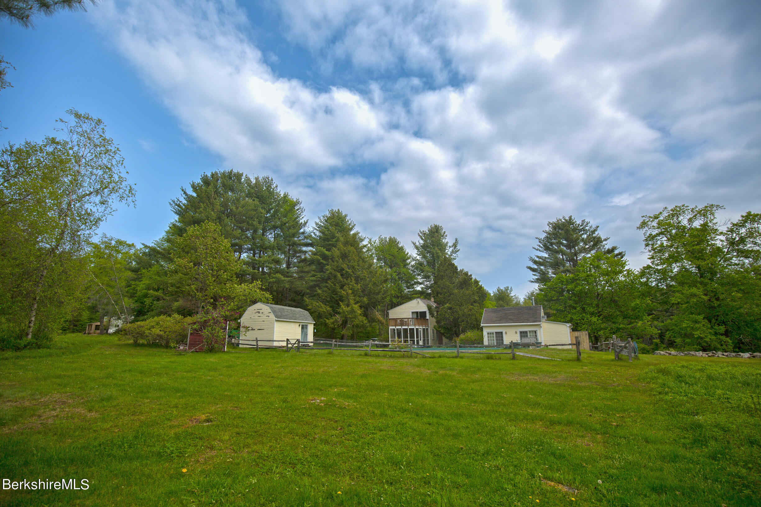 75 Old Quarry Road Otis, MA 01253 - Photo 36 of 39 a front view of a house with a yard
