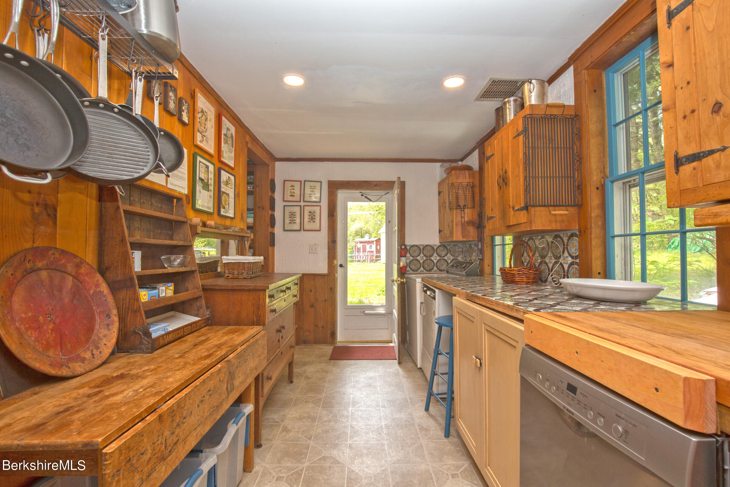 75 Old Quarry Road Otis, MA 01253 - Photo 4 of 39 a open kitchen with stainless steel appliances granite countertop a sink and cabinets