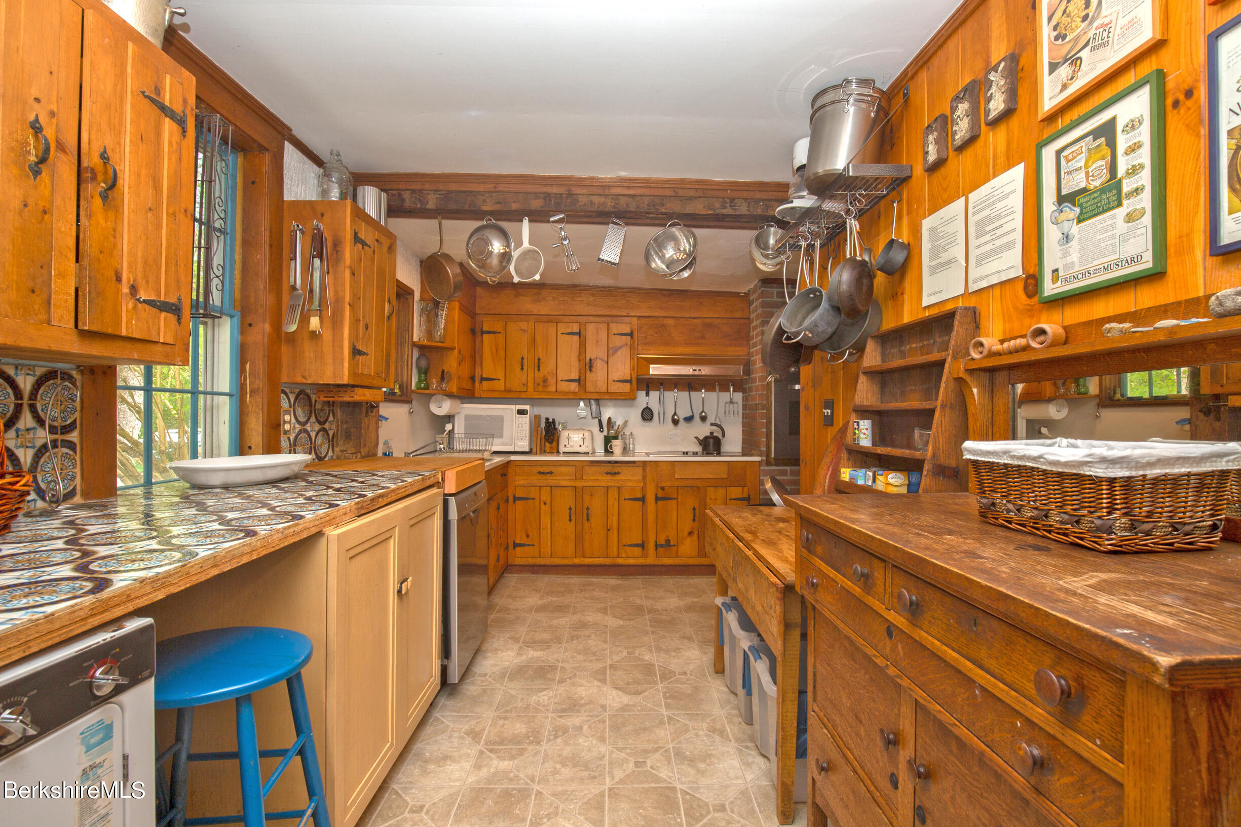 75 Old Quarry Road Otis, MA 01253 - Photo 5 of 39 a large kitchen with stainless steel appliances granite countertop a sink and cabinets
