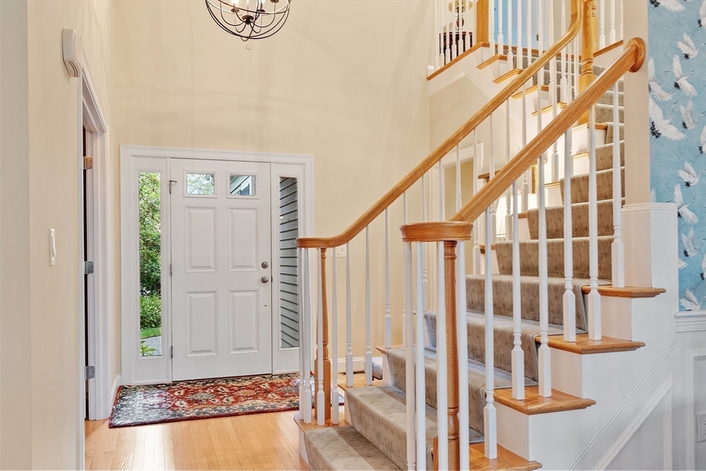 51 South Cottage Road, Unit 112 Belmont, MA 02478 - Photo 18 of 41 a view of a hallway with staircase