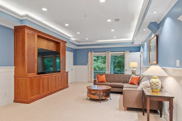 a bathroom with a window and a shower