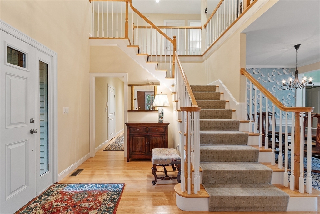 51 South Cottage Road, Unit 112 Belmont, MA 02478 - Photo 3 of 41 a view of entryway and hall with wooden floor
