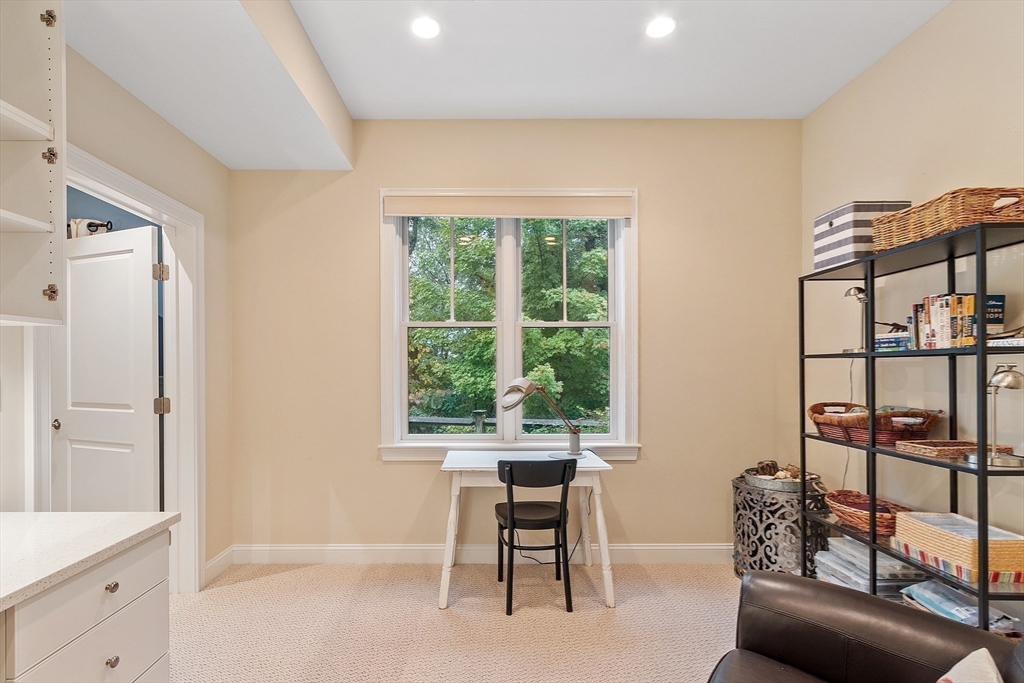 51 South Cottage Road, Unit 112 Belmont, MA 02478 - Photo 31 of 41 a workspace with furniture and a window