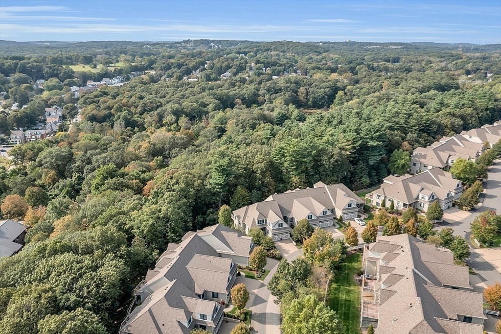 51 South Cottage Road, Unit 112 Belmont, MA 02478 - Photo 39 of 41 an aerial view of a house with a yard