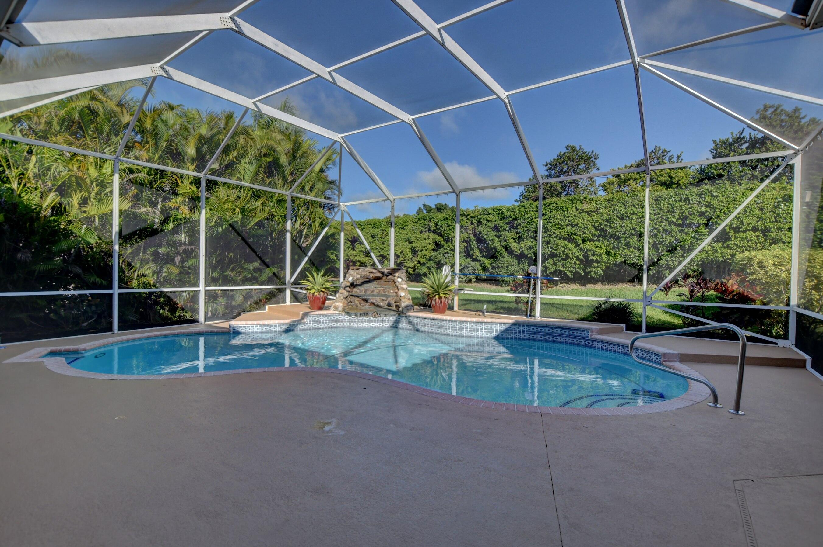 10546 Maple Chase Drive Boca Raton, FL 33498 - Photo 37 of 39 Screened Pool and Patio Area