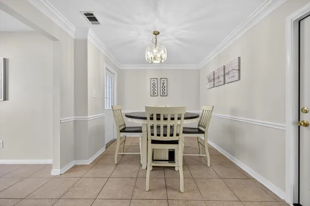 a view of kitchen with furniture and wooden floor
