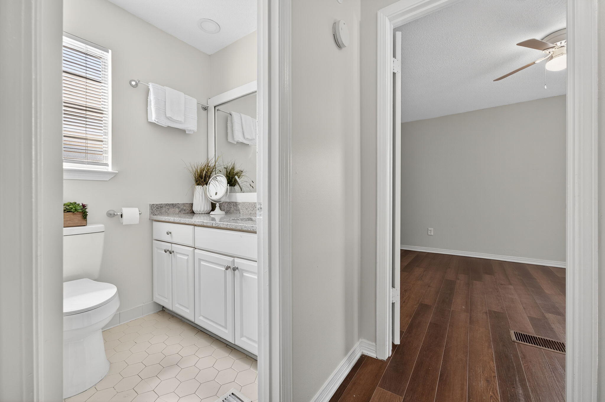 150 Beach Drive Fort Walton Beach, FL 32547 - Photo 36 of 56 a bathroom with a granite countertop sink toilet and shower