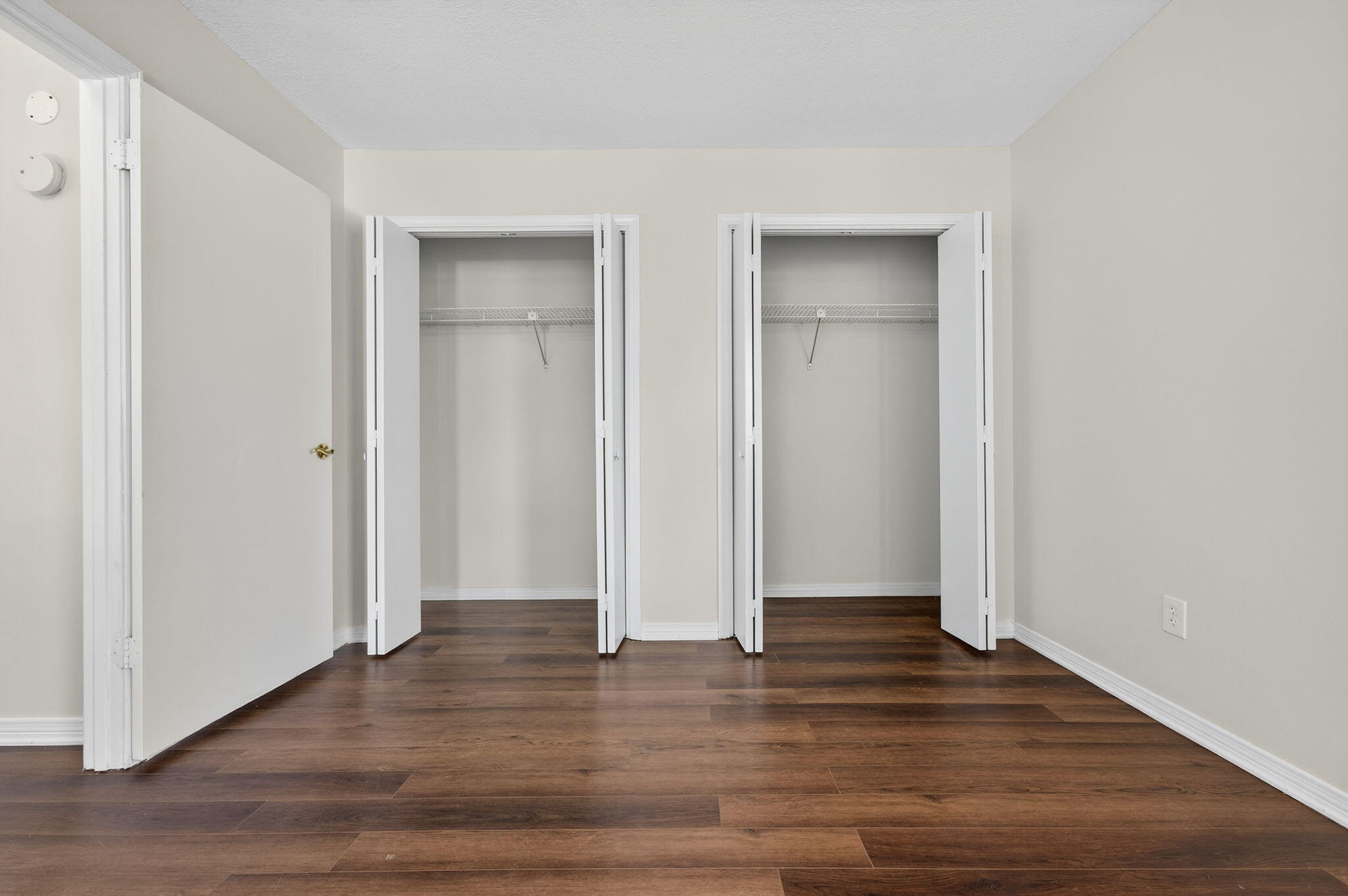 150 Beach Drive Fort Walton Beach, FL 32547 - Photo 41 of 56 an empty room with wooden floor and closet