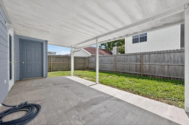 a view of a backyard with a garden