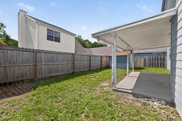 an aerial view of lake residential houses with outdoor space and lake view