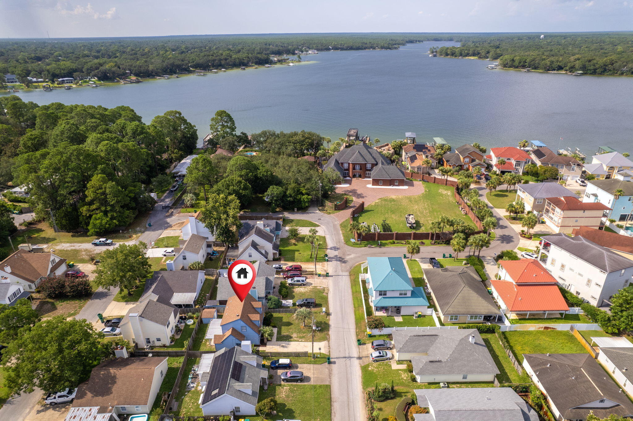150 Beach Drive Fort Walton Beach, FL 32547 - Photo 52 of 56 an aerial view of lake residential houses with outdoor space and lake view