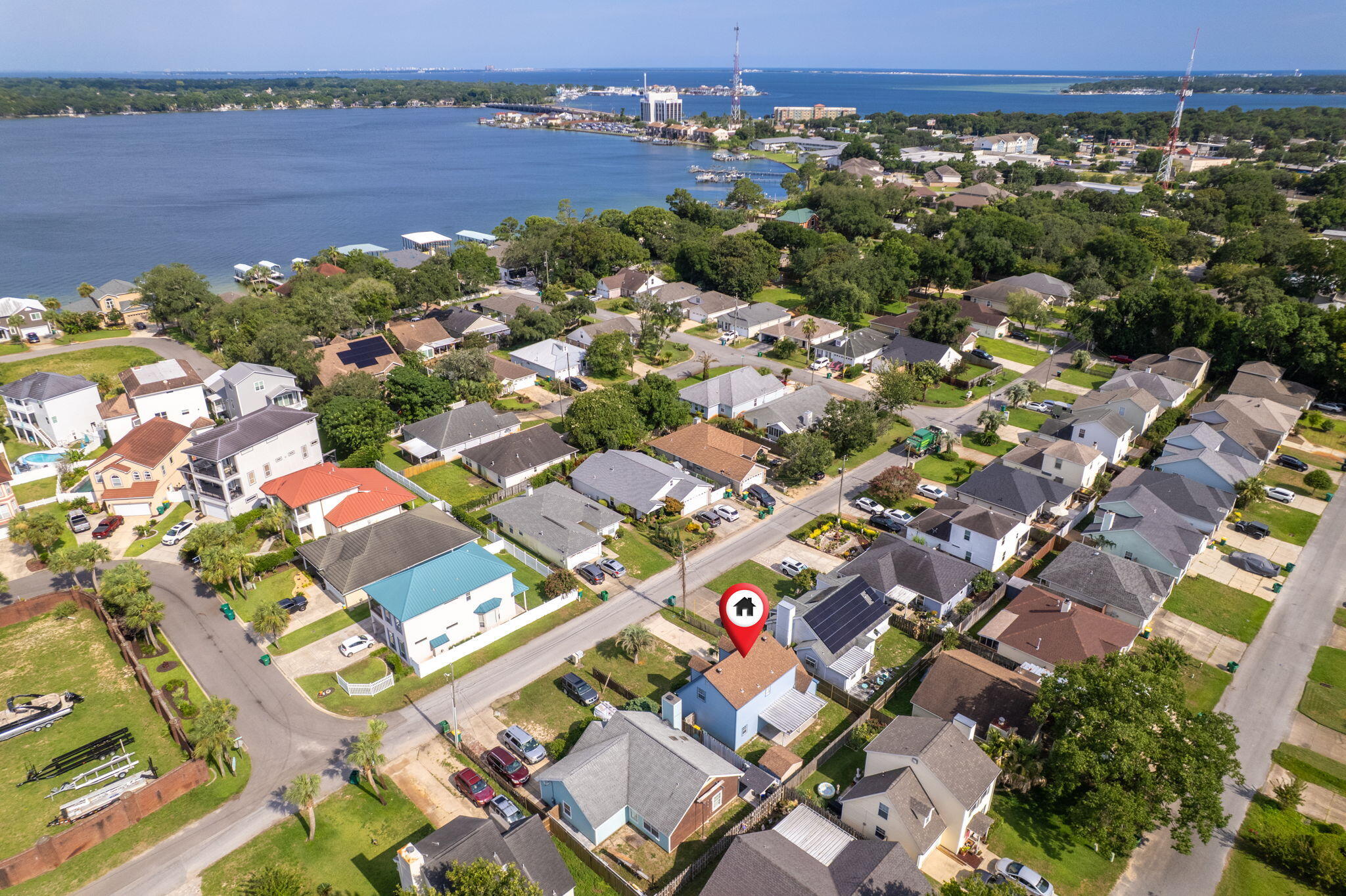 150 Beach Drive Fort Walton Beach, FL 32547 - Photo 55 of 56 an aerial view of a city with lots of residential buildings ocean and mountain view