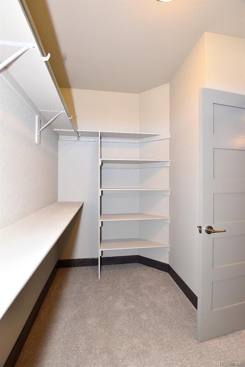 4792 Mariana Ridge Court Loveland, CO 80537 - Photo 26 of 39 a view of an empty walk in closet