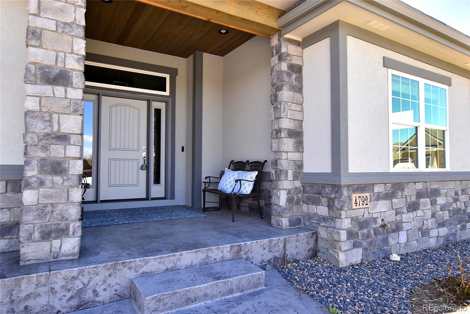 4792 Mariana Ridge Court Loveland, CO 80537 - Photo 3 of 39 a view of front door of house with outdoor space