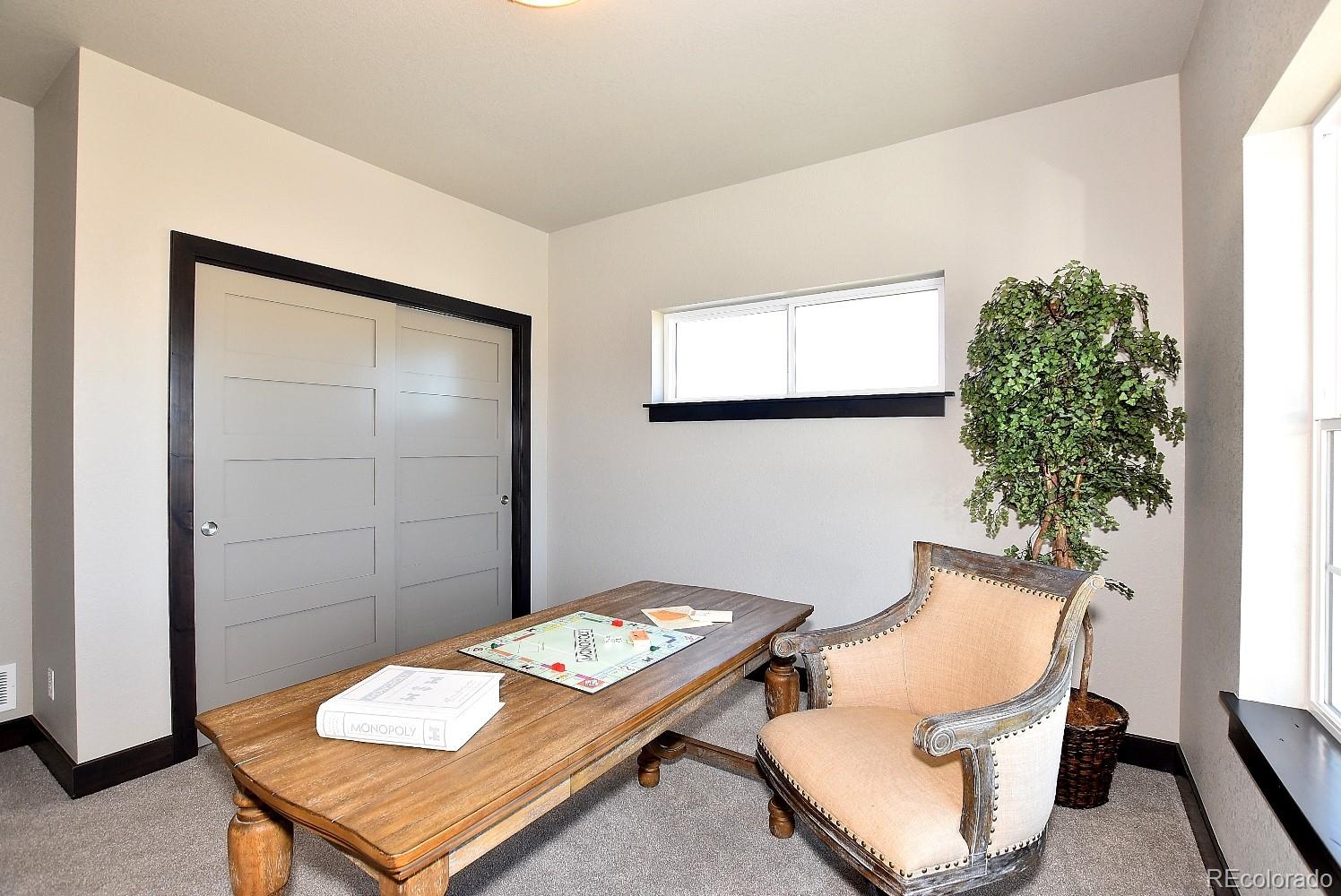 4792 Mariana Ridge Court Loveland, CO 80537 - Photo 34 of 39 a work room with furniture and window