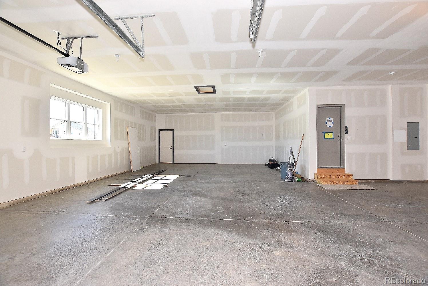 4792 Mariana Ridge Court Loveland, CO 80537 - Photo 37 of 39 an empty room with windows