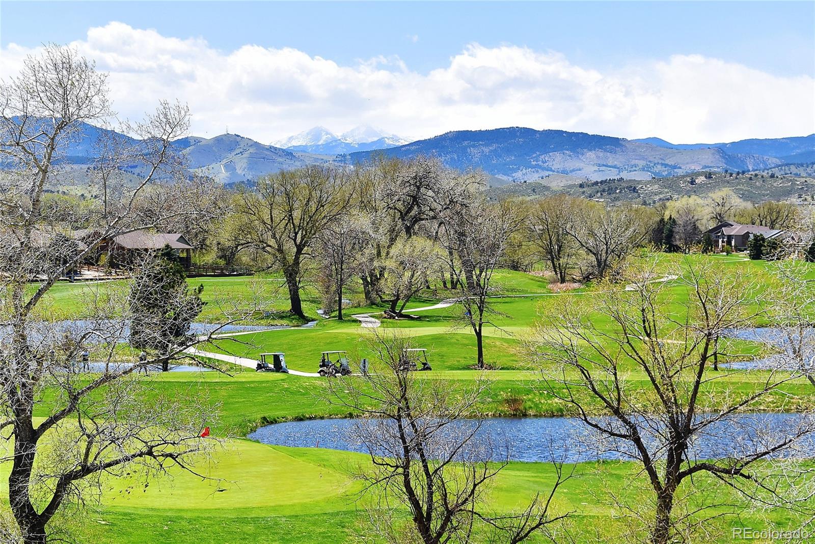 4792 Mariana Ridge Court Loveland, CO 80537 - Photo 39 of 39 a view of a garden with a houses