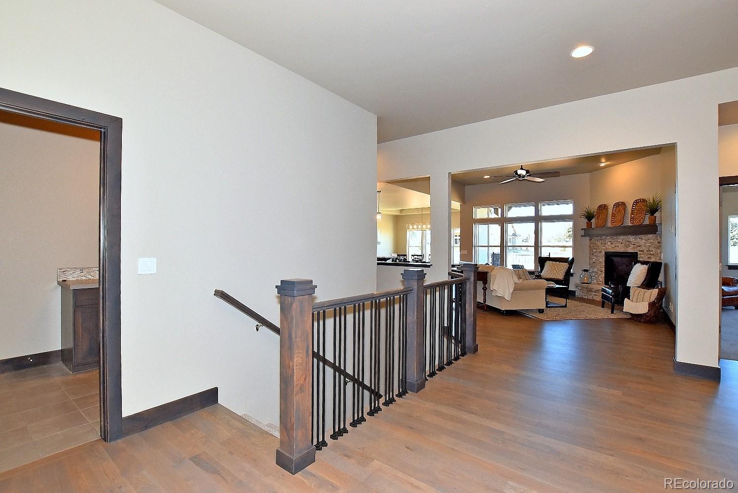 4792 Mariana Ridge Court Loveland, CO 80537 - Photo 5 of 39 a view of a livingroom with furniture and windows