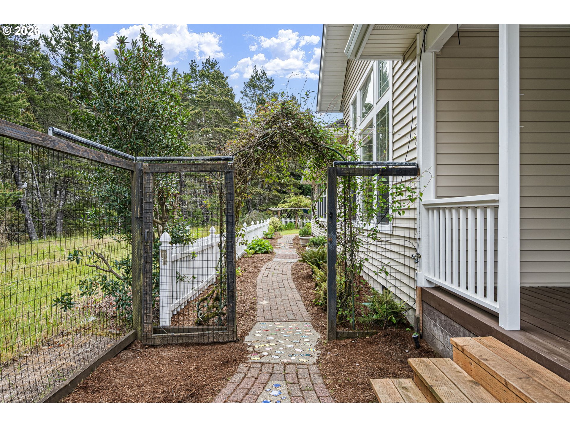 2218 Willow Loop Florence, OR 97439 - Photo 12 of 47 a view of a porch