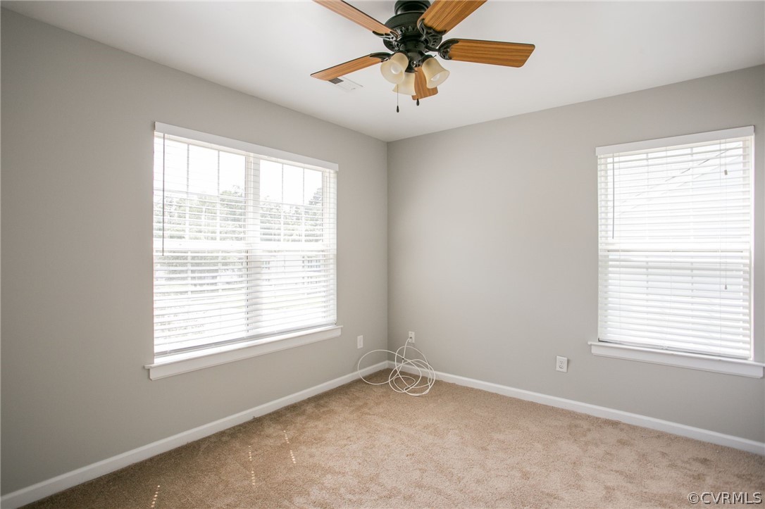 3248 Ransom Hills Road Richmond, VA 23237 - Photo 23 of 28 a view of an empty room with a window