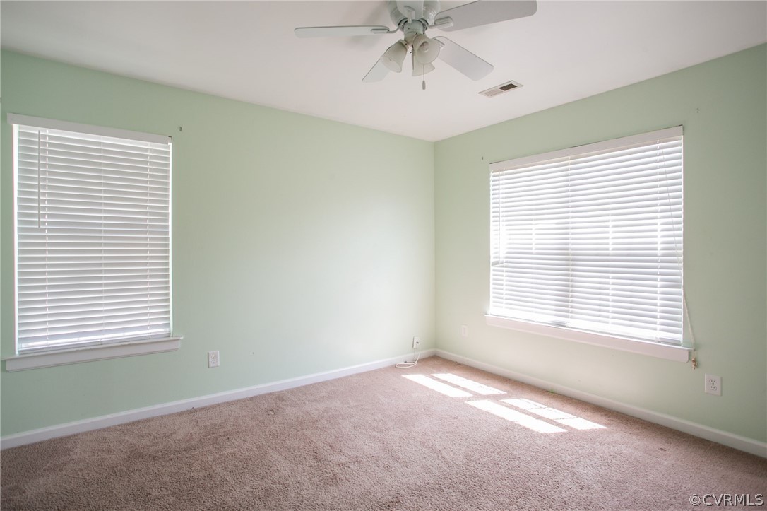 3248 Ransom Hills Road Richmond, VA 23237 - Photo 24 of 28 a view of an empty room with a window