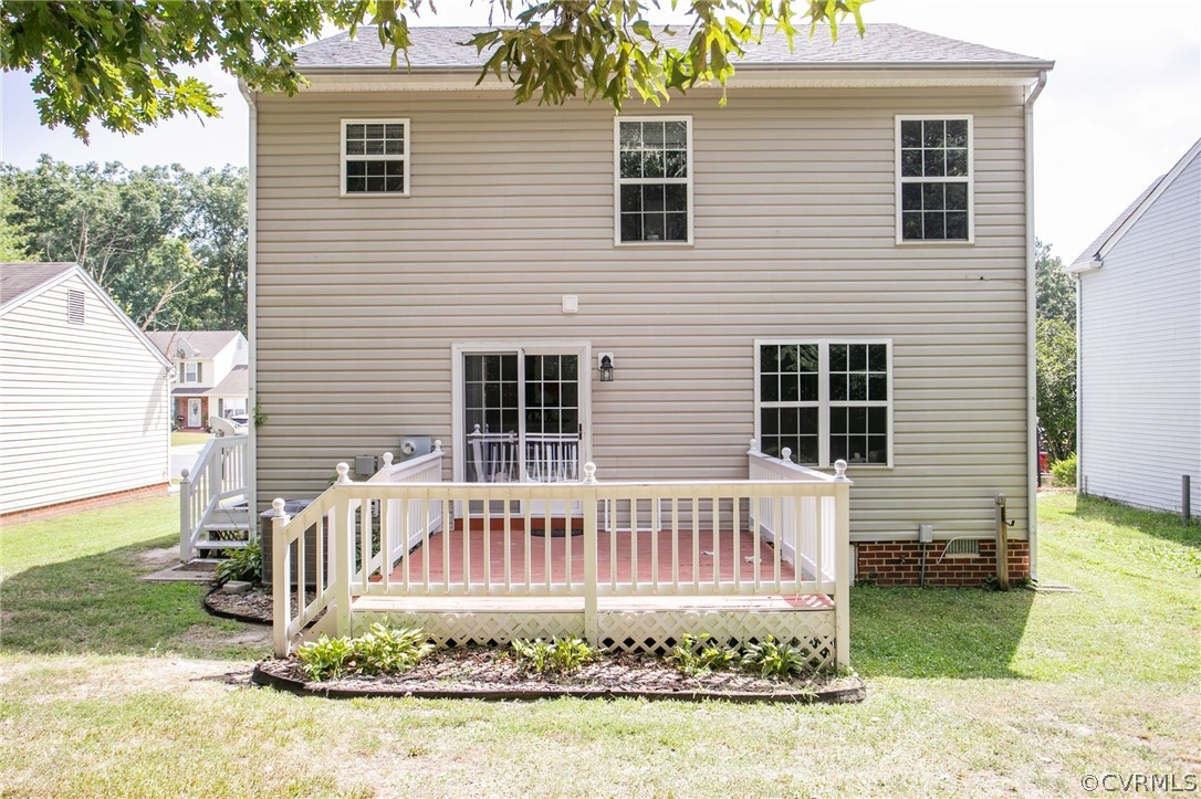 3248 Ransom Hills Road Richmond, VA 23237 - Photo 26 of 28 a front view of a house with garden