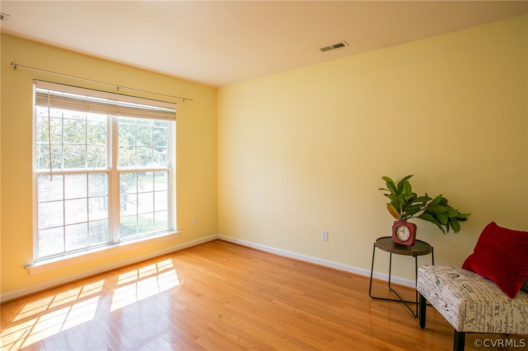 3248 Ransom Hills Road Richmond, VA 23237 - Photo 4 of 28 a living room with furniture and a window