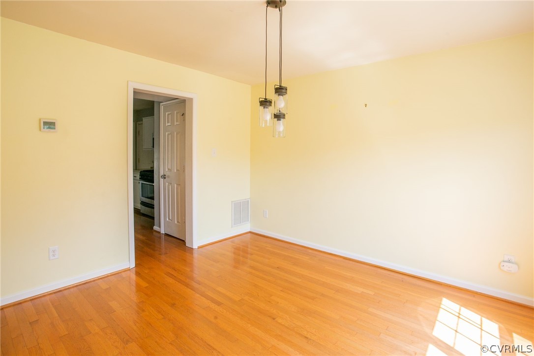 3248 Ransom Hills Road Richmond, VA 23237 - Photo 7 of 28 a view of a big room with a door