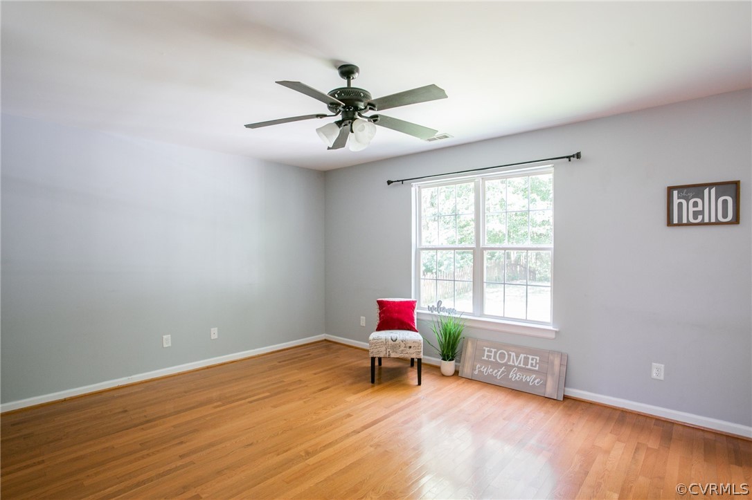 3248 Ransom Hills Road Richmond, VA 23237 - Photo 9 of 28 a living room with furniture and a window