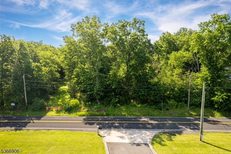 73 Weston Road Hillsborough, NJ 08844 - Photo 6 of 7 a view of a swimming pool with a patio