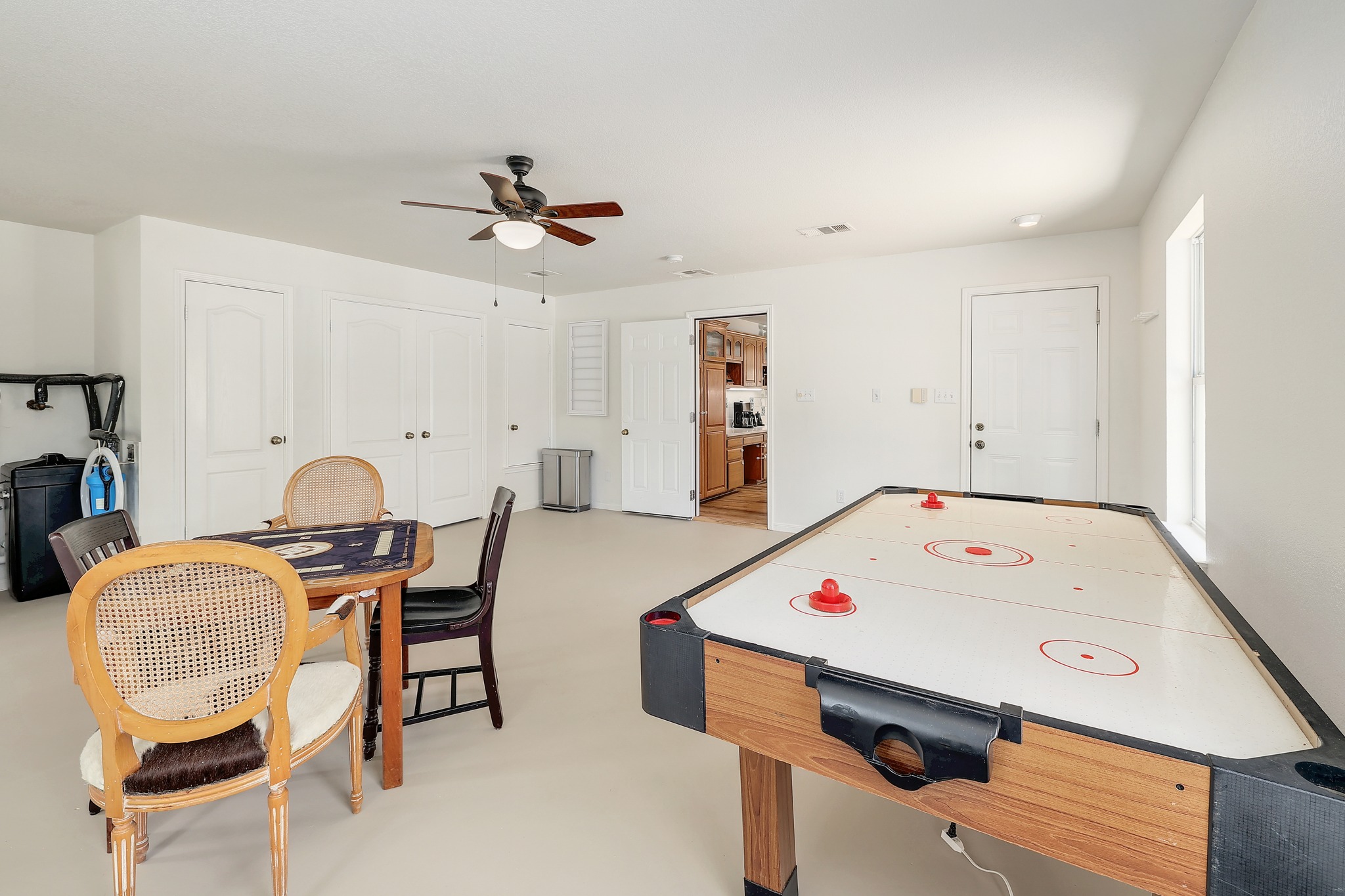 1455 County Road 262 Georgetown, TX 78633 - Photo 11 of 40 a workspace with furniture and wooden floor