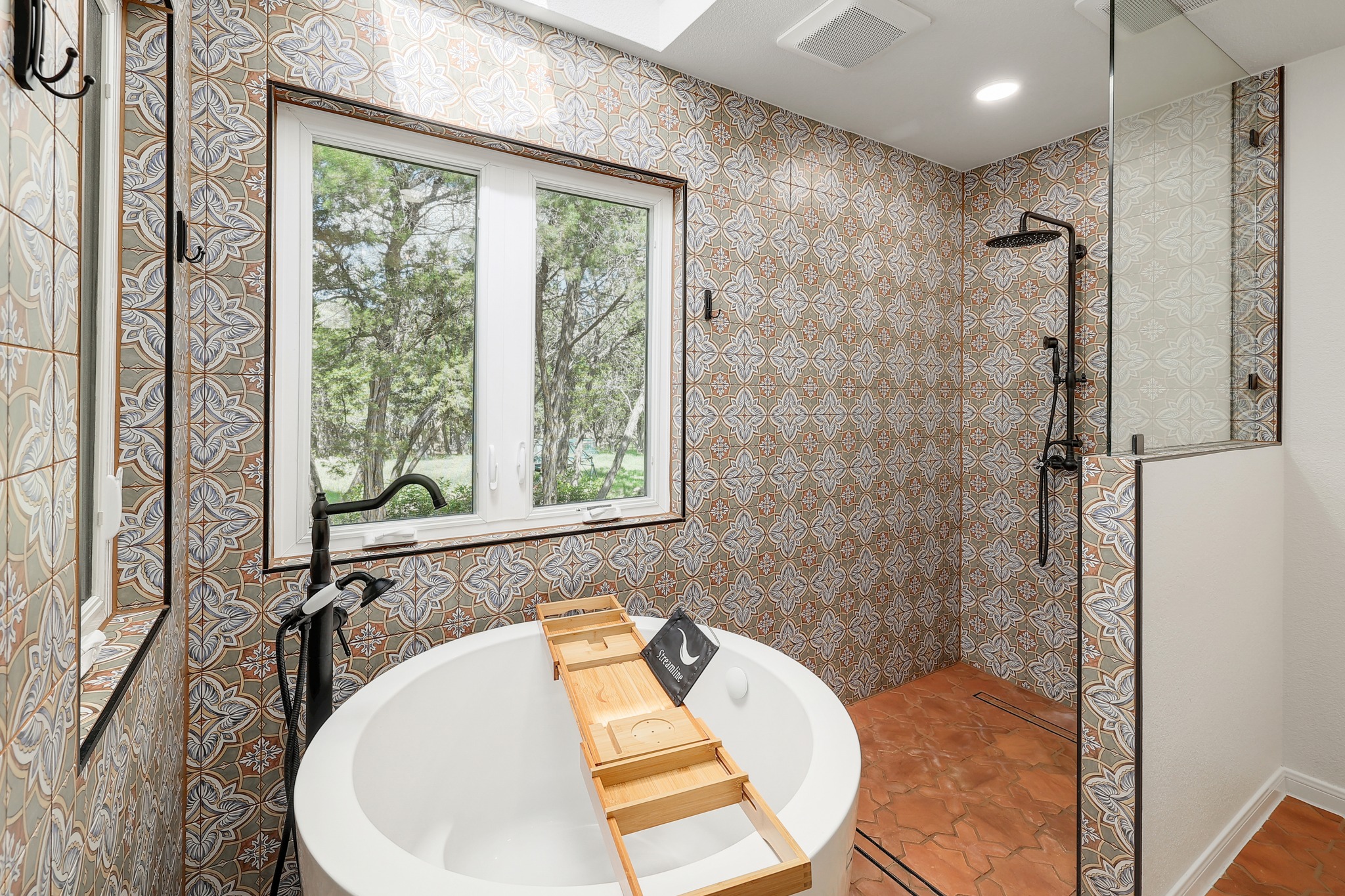 1455 County Road 262 Georgetown, TX 78633 - Photo 18 of 40 a bathroom with a tub and a shower
